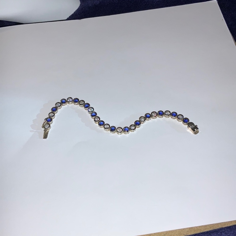 Woman’s Sterling CZ Blue and White Tennis Bracelet.